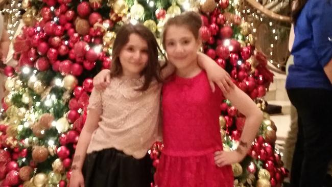 Thalia Hakin with sister Maggie, 9, who suffered a broken leg.