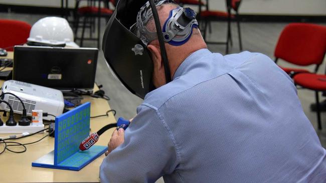 AUGMENTED REALITY: Garry Hargreaves from Tafe Queensland demonstrates fusion welding to attendees at the South West Tafe in Kingaroy. Picture: Matt Collins