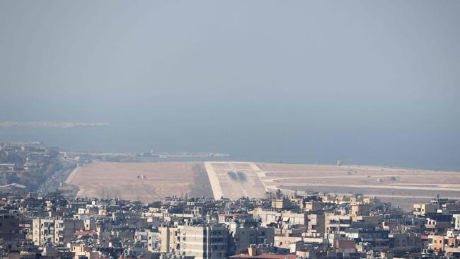 A general view shows an airport runway and southern suburb of the Lebanese capital Beirut on August 25. Picture: Anwar Amro/AFP