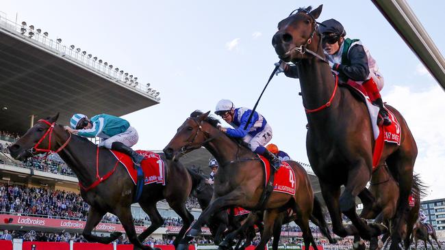 Romantic Warrior (left) hits the line ahead of Mr Brightside (right) and Alligator Blood. Picture: Michael Klein