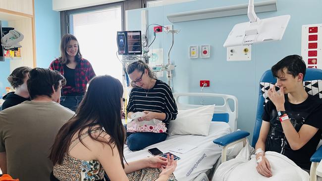 Matt Millar with his family in hospital. Picture: contributed