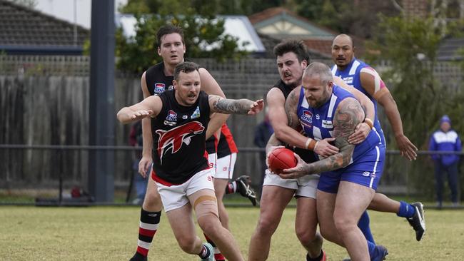 SFL: Moorabbin Kangaroos v Frankston Dolphins. Scott Levy (Moorabbin Kangaroos) and Daniel Edwards-Fisk (Frankston Dolphins).  Picture: Valeriu Campan