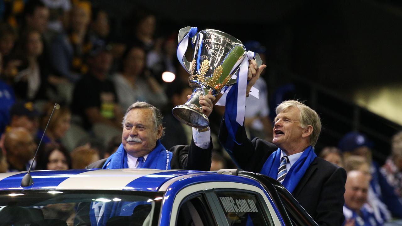Ron Barassi and Barry Davis with the 1975 Premiership Cup. Picture: George Salpigtidis
