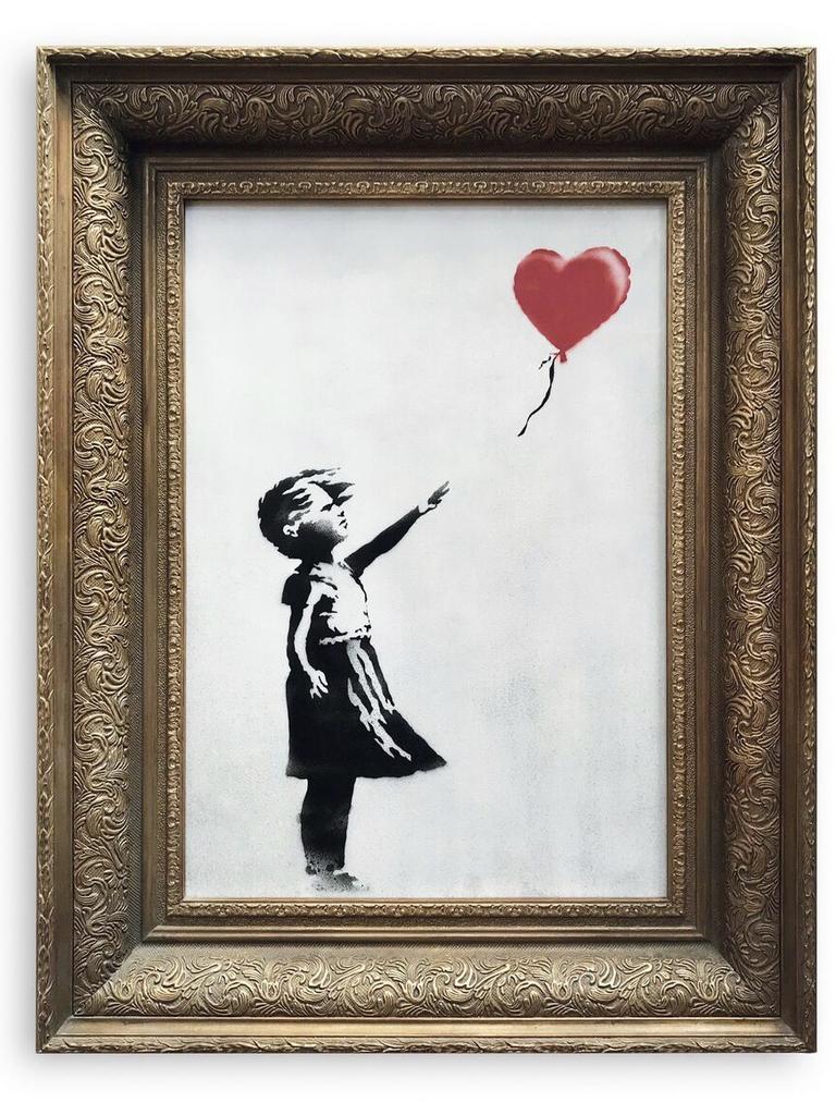 Girl with Balloon is one of the anonymous artist’s most famous pieces. Picture: Sotheby's/AP