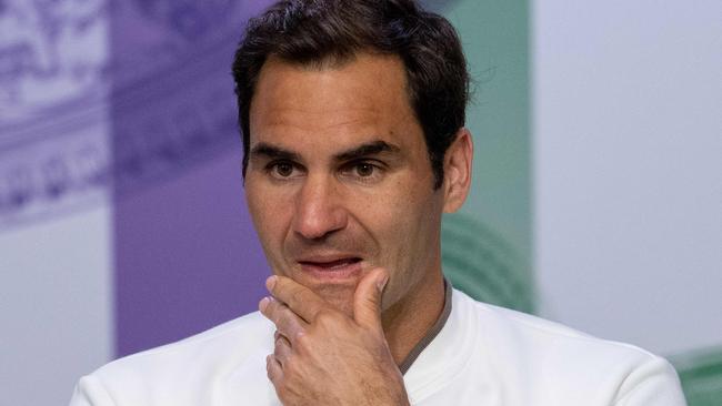 Roger Federer in the Wimbledon interview room. Photo by Joe TOTH / AELTC / POOL / AFP.