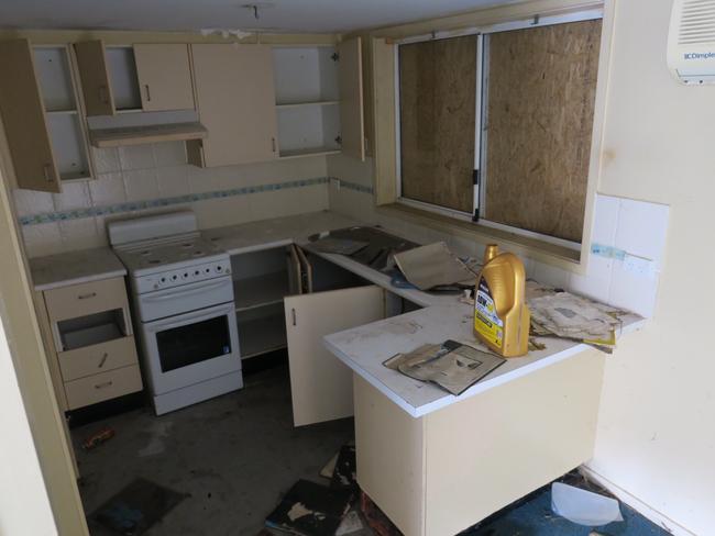 The kitchen of the vacant social housing duplex looks as if it has been ransacked. Picture: supplied