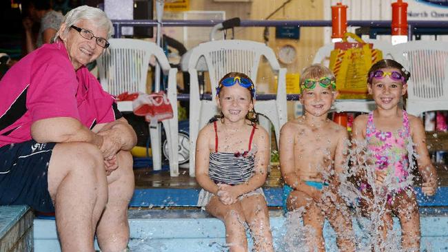 Pat Wright with some of Mackay's young swimmers all receiving lessons and learning from one of the communities most loved people. Picture: Pat Wright Swim School