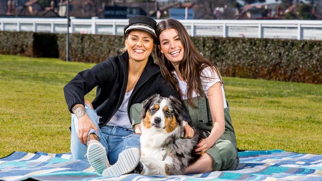 Moana Hope and partner Isabella Carlstrom with 'Aya' the dog. Picture: Tim Carrafa