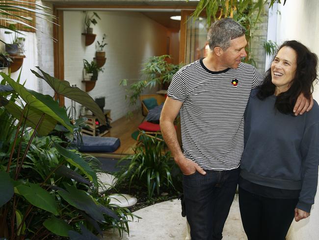 Sacha Coles and Lydia Ho in their garden. Picture: John Appleyard