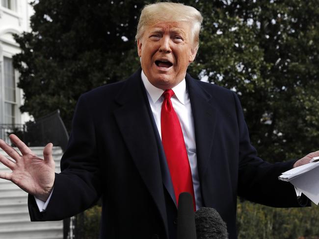 US President Donald Trump holds handwritten notes as he speaks to the media about the House Intelligence Committee testimony of US Ambassador to the European Union Gordon Sondland. Picture: AP