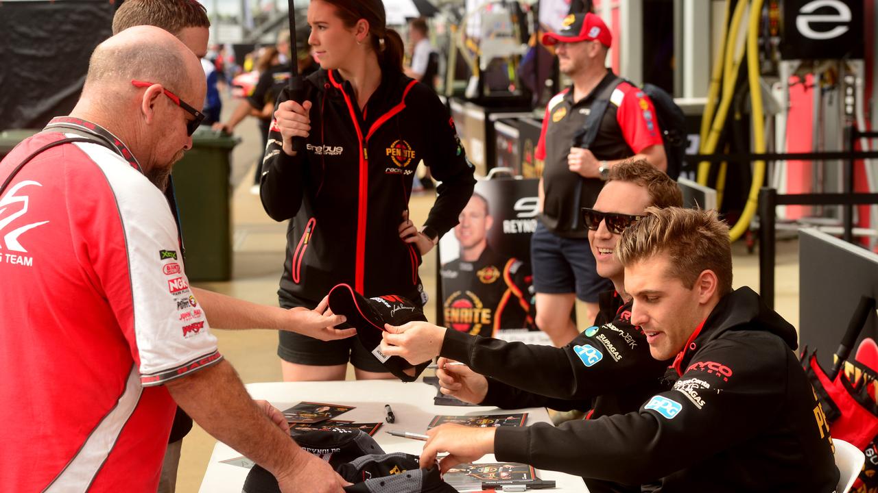 Watpac Townsville 400 Day One. Socials. Supercar drivers David Reynolds and Anton de Pasquale sign autographs. Picture: Evan Morgan