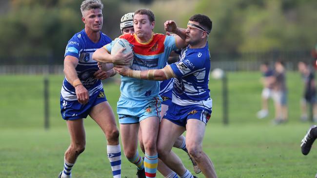 De La Salle halfback Jack Williams tries to burst through. Picture: Steve Montgomery | OurFootyTeam