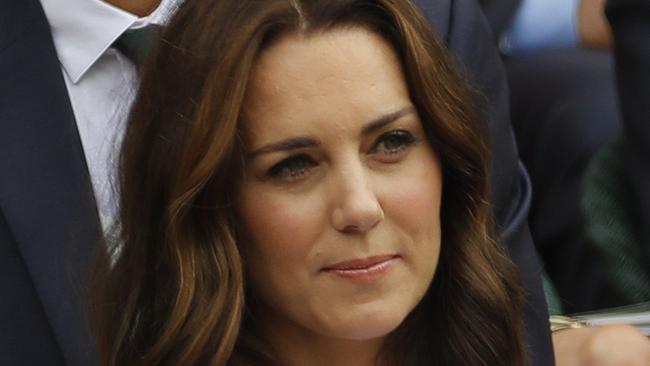 Kate Middleton has captured the spirit of Wimbledon in a summery white dress, with a vibrant floral print. Picture: AP.