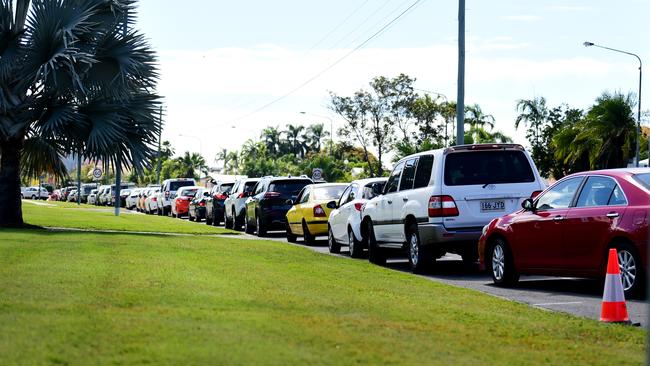 Vehicles line up outside the COVID-19 Testing Clinic in Kirwan, Townsville. Picture: Alix Sweeney