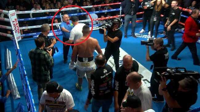 John Cauchi is confronted by Paul Gallen after his bout against Justis Huni.