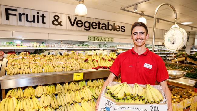 As a member of the Coles fresh produce team when he’s not training for the upcoming Commonwealth Games, Brandon Starc knows his way around the banana section. Picture: supplied