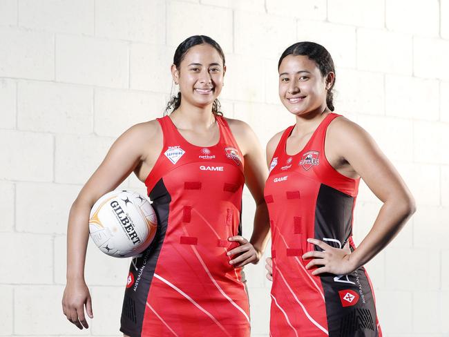 Jayden Molo, 17, and Tia Molo, 15, pictured at St Peters Lutheran College, Brisbane 10th May 2023. They play netball for ACU Brisbane North Cougars. (Image/Josh Woning)