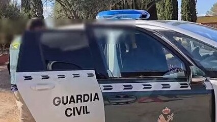 The man is seen being arrested by police. Picture: Spanish Civil Guard