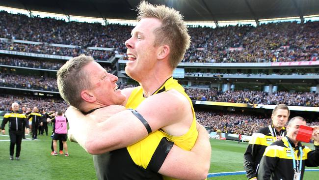 Jack Riewoldt jumps into the arms of coach Damien Hardwick. Picture: Michael Klein