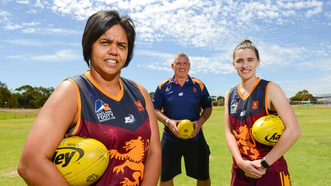 SMOSH West Lakes women’s players Bronwyn Davey (L) and Remy Grant with coach Greg Phillips. Picture: AAP/Brenton Edwards