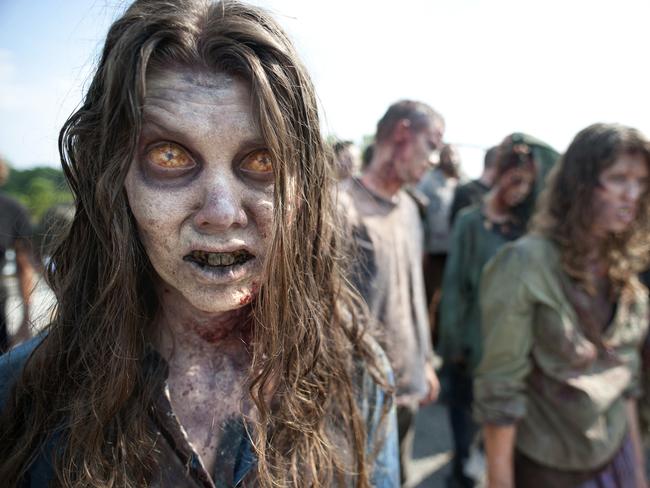 In this image released by AMC, zombies appear in a scene from the second season of the AMC original series, 