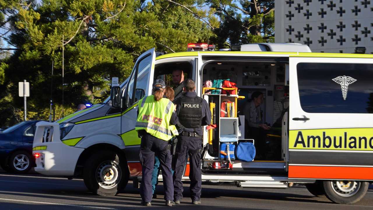 A primary school girl has suffered head injuries after being struck by a vehicle on Middle Street this afternoon. Picture: Kate McCormack