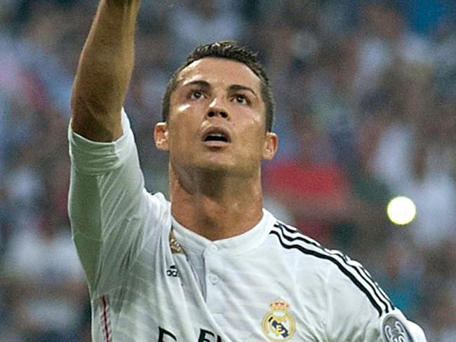 MADRID, SPAIN - MAY 13: Cristiano Ronaldo of Real Madrid celebrates after scoring the opening goal from the penalty spot during the UEFA Champions League Semi Final, second leg match between Real Madrid and Juventus at Estadio Santiago Bernabeu on May 13, 2015 in Madrid, Spain. (Photo by Gonzalo Arroyo Moreno/Getty Images)