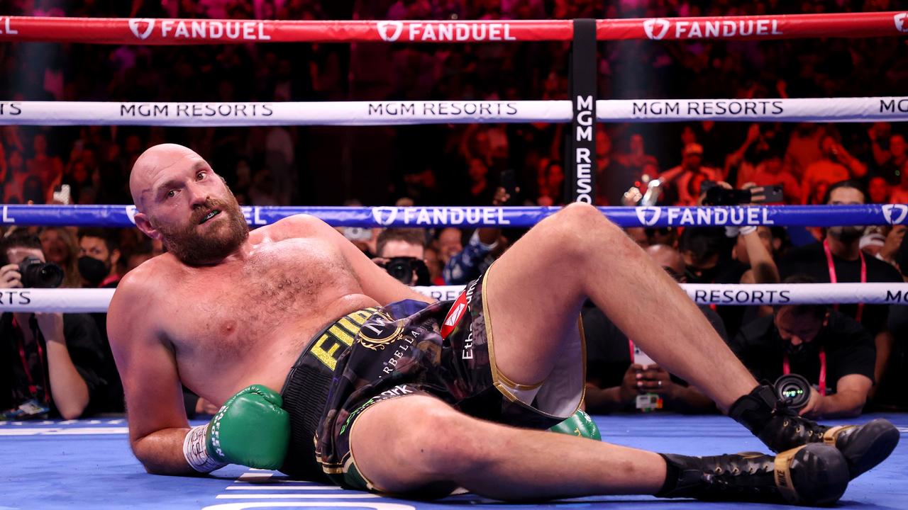 Tyson Fury reacts after a knock down. Photo by Al Bello/Getty Images.