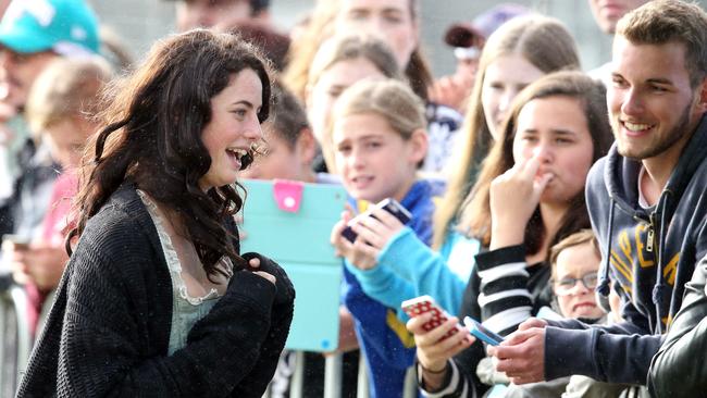 Pirates of the Caribbean: Dead Men Tell No Tales star Kaya Scodelario greets fans during filming at The Spit. Picture: Richard Gosling