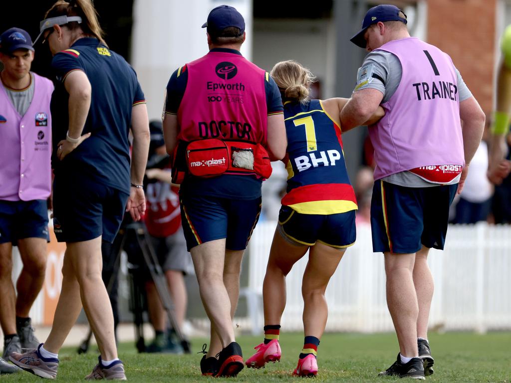 Nikki Gore is helped from the ground at Norwood Oval. Picture: James Elsby/AFL PHOTOS/Getty