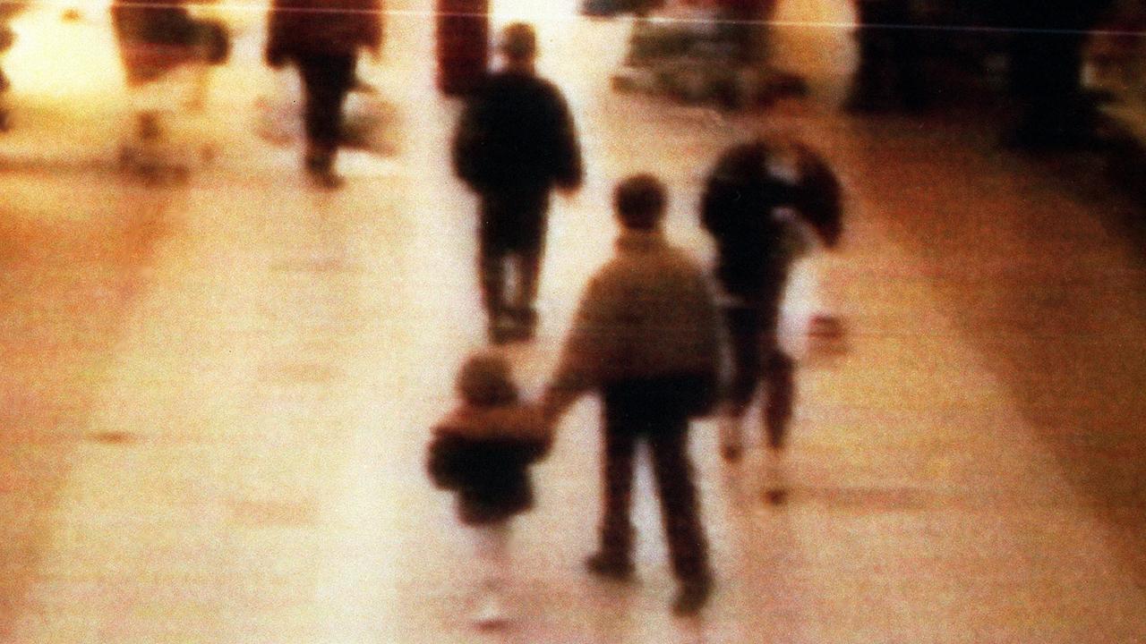 CCTV shows toddler James holding hands with his abductor and killer Venables at the Bootle Strand shopping mall on 12th February 1993