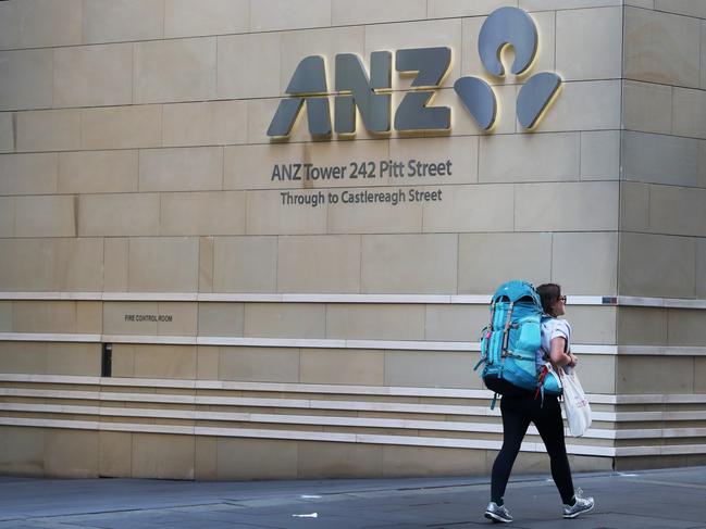 SYDNEY, AUSTRALIA - FEBRUARY 26: A pedestrian moves past a Australia & New Zealand Banking Group Ltd. (ANZ) branch in Sydney on February 26, 2024 in Sydney, Australia. The recent approval by the Australian Competition Tribunal of ANZ's A$4.9 billion ($3.2 billion) acquisition of Suncorp's banking business marks a major development in the country's financial landscape, signaling the largest banking merger since the global financial crisis. (Photo by Lisa Maree Williams/Getty Images)