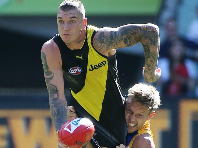 AFL : Round 3 , Richmond V West Coast Eagles at the Melbourne Cricket Ground (M.C.G.)  8th  April,  West Coast's Sam Mitchell can't stop Richmond's Dustin MartinPicture : George Salpigtidis