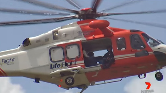 Searchers on a LifeFlight helicopter scour the Tansey bushland for Robert Weber Pictures: Ch 7 Sunshine Coast