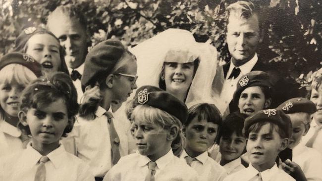 Lyn Vaak pictured on her wedding day with young members of GFS Australia. Picture: Supplied