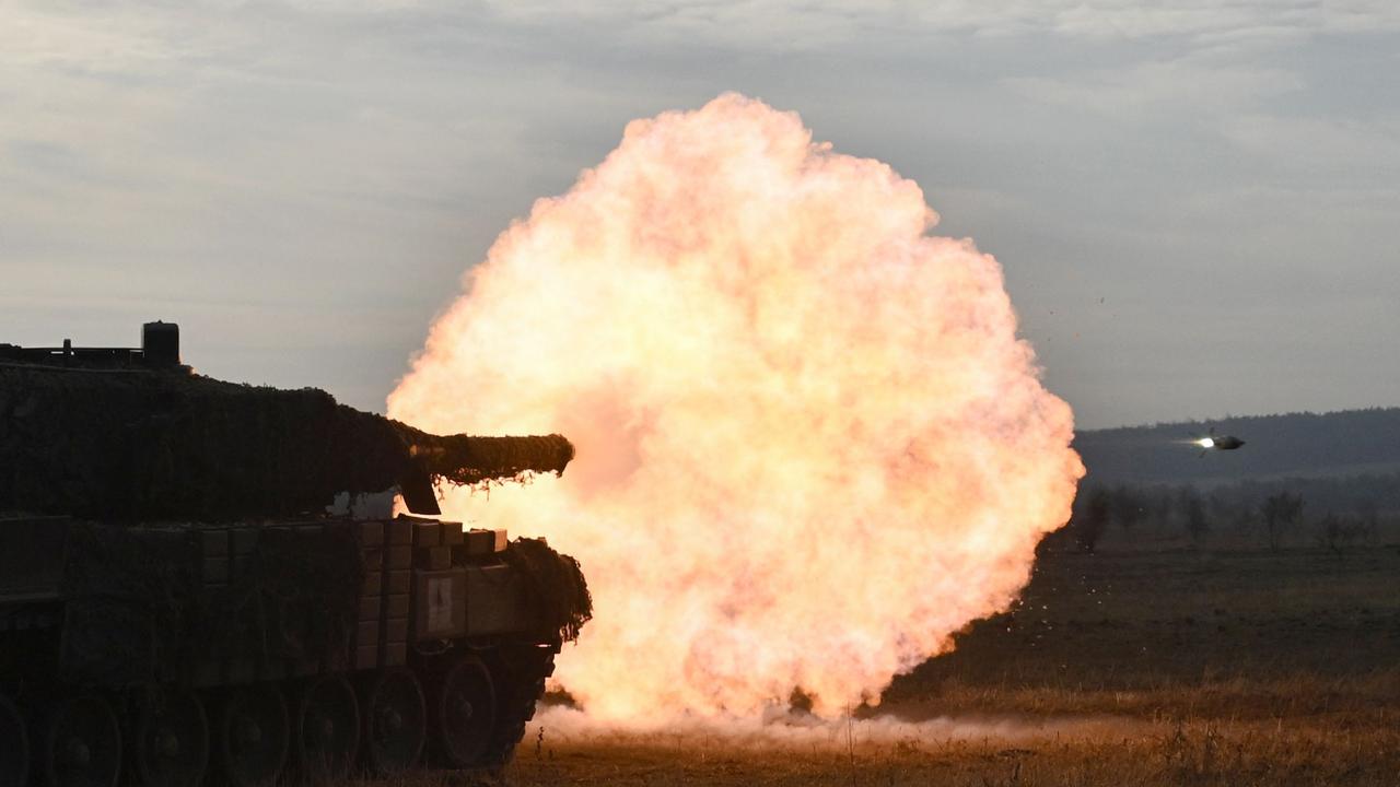 Tankers from the 33rd separate mechanised brigade of the Ukrainian Ground Forces fire with a Leopard 2A4 tank. Picture: Genya Savilov / AFP