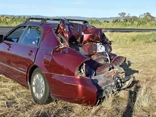 A car was severely damaged in a two-car crash near a sunflower field on the New England Highway on Saturday January 19. Picture: Elyse Wurm