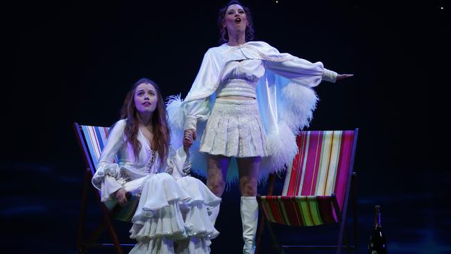 Muriel (Maggie McKenn) and Rhonda (Madeleine Jones) take iconic Aussie movie Muriel's Wedding to the stage. Picture: AAP Image 