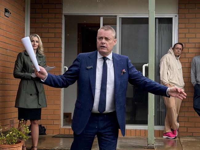 McGrath Geelong auctioneer David McGuiness and listing agent Egle Skridulis conduct the auction at 38 Marendaz Rd, Waurn Ponds.