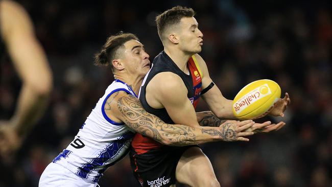 Essendon forward Orazio Fantasia marks in front of Marley Williams. Picture: Mark Stewart