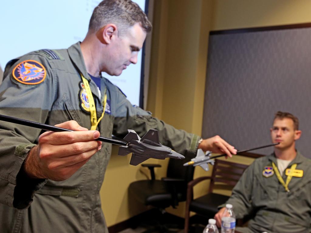 Australian Pilots training in the F35 fighter Jets Luke Airforce Base in Phoenix Arizona. Squadron leader Wing Commander Darren Clare (L) briefs Flight Lieutenant “Damo” before a flight . Picture: Nathan Edwards
