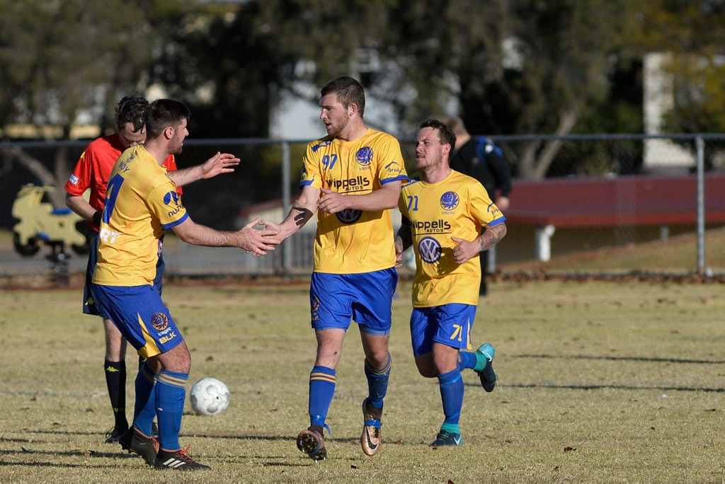 USQ FC celebrate a goal by Aaron Wieden (#97) against Rockville in Toowoomba Football League Premier Men round 14 at Captain Cook Reserve Des McGovern oval, Sunday, June 24, 2018. Picture: Kevin Farmer