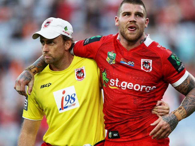 SYDNEY, AUSTRALIA - APRIL 02:  Josh Dugan of the Dragons is assisted from the field after sustaining an injury during the round five NRL match between the Wests Tigers and the St George Illawarra Dragons at ANZ Stadium on April 2, 2017 in Sydney, Australia.  (Photo by Matt King/Getty Images)