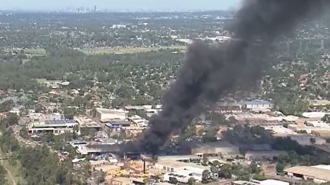 Emergency crews respond to a massive factory fire at St Mary's. Picture: Nine News