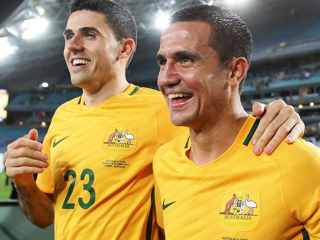 Socceroos Tim Cahill celebrates victory with Socceroos Tom Rogic after the Socceroos v Syria World Cup Qualifier at ANZ Stadium, Sydney. Picture: Brett Costello