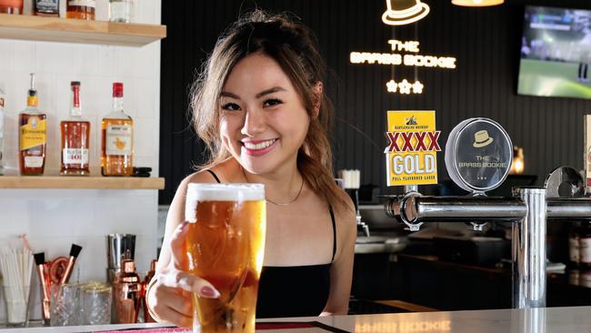 Brass Bookie bartender Sinead Tan is ready to pour plenty of Macalisters pints at the bar's grand opening party this Saturday. Picture: Brendan Radke