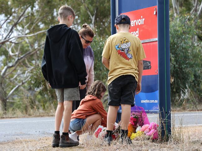 A family lays a tribute for Kobi. Picture: NCA NewsWire/David Mariuz