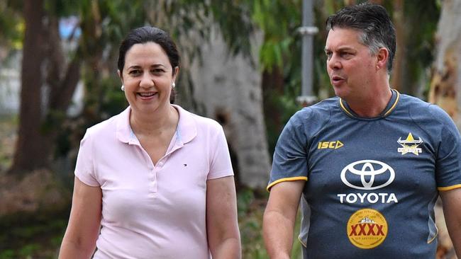 Queensland Premier Annastacia Palaszczuk walking with  Member for Thuringowa, Aaron Harper through Riverside Park in Townsville. Picture: AAP Image/Darren England