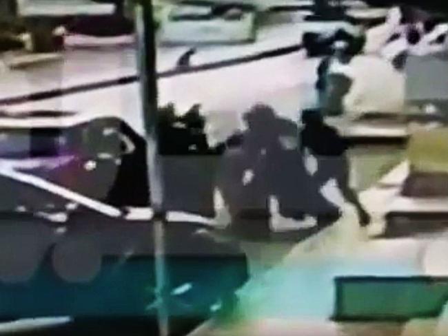 CCTV footage captured the moment the contractors pistol whipped the grandmother during the alleged abduction. Picture: Youtube.