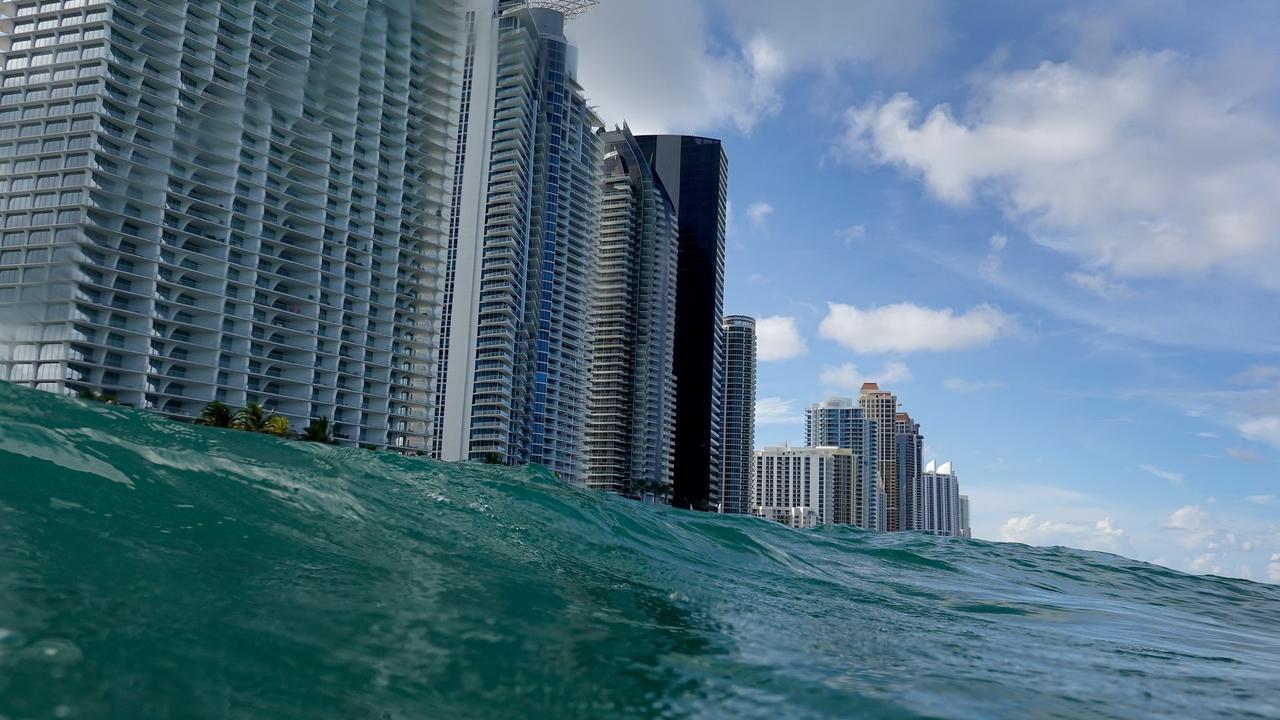 Waves lap ashore near condo buildings in the Florida city of Sunny Isles. Picture: Joe Raedle/Getty Images/AFP